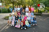 Kinder der Zebraklasse mit ihrer Klassenlehrerin.